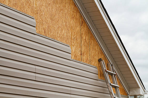 Professional Siding Installation technician working in Russellville, KY